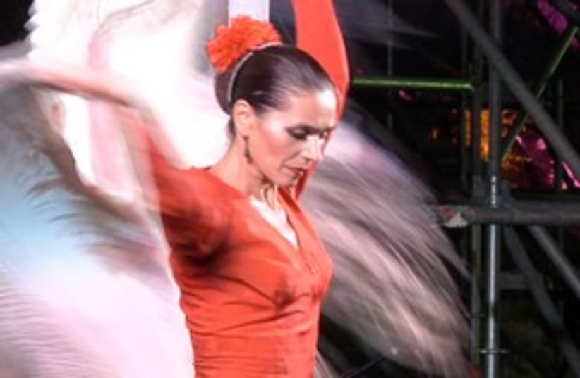 Spanish style dancer in red 311 (photo credit: iTravelJerusalem )
