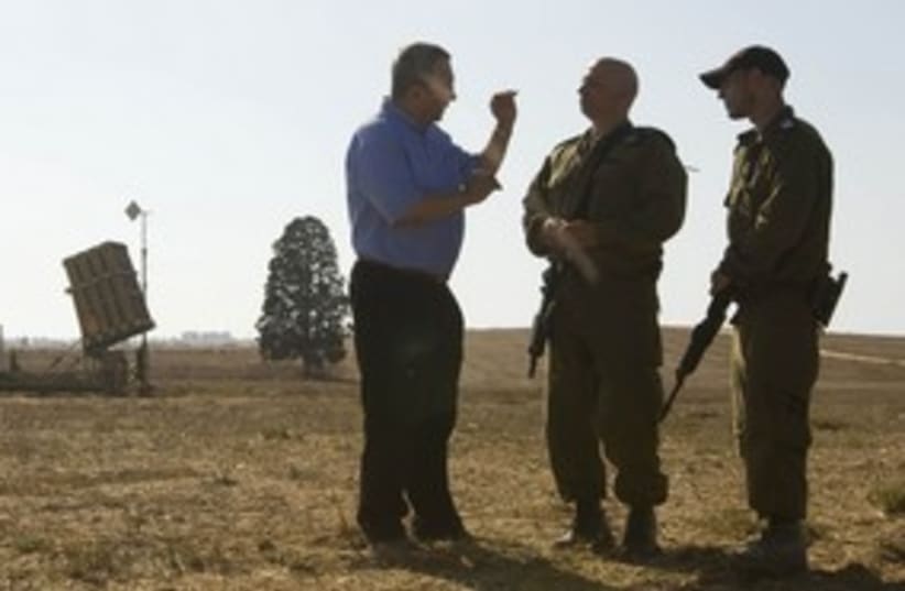 Barak with IDF soldiers at Iron Dome_311 (photo credit: Reuters)