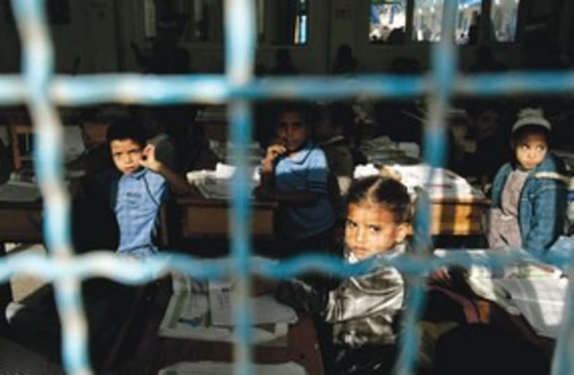 Palestinian pupils attend an UNRWA school in Gaza 311 (photo credit: REUTERS)