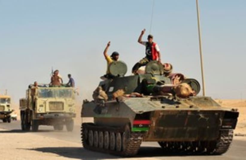 Libyan Rebels in Tank 311 (photo credit: REUTERS)