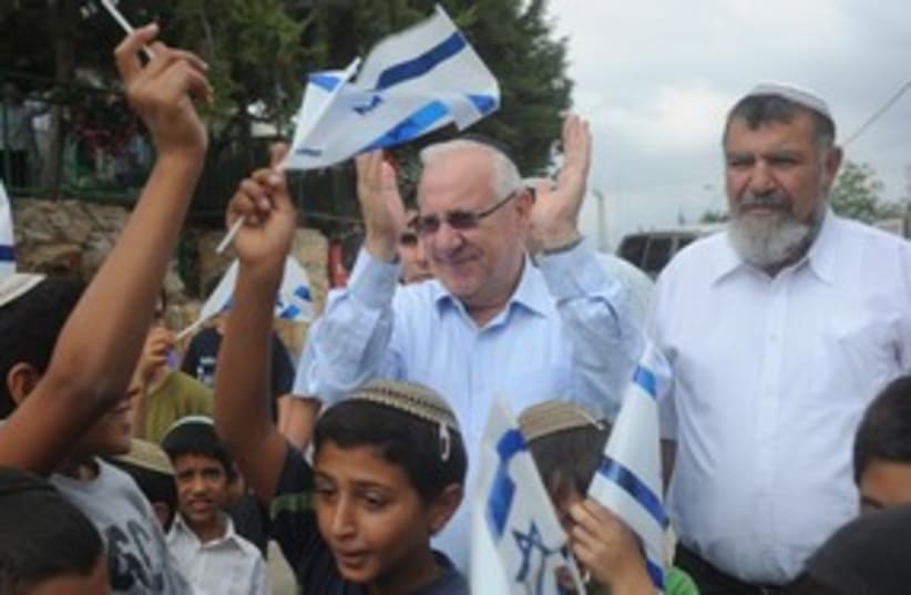 Reuven Rivlin joyous in Itamar_311 (photo credit: Jorge Nominevski / Knesset)