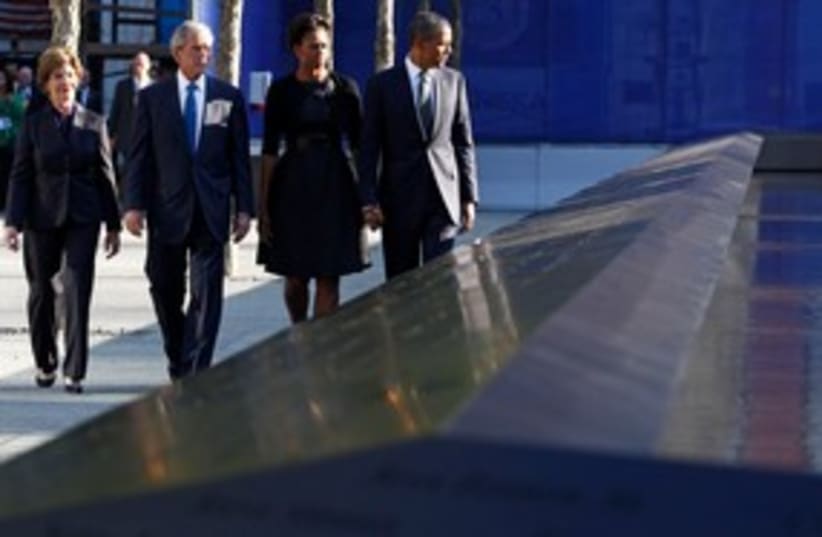 US President Obama his wife at Ground Zero 311 (photo credit: REUTERS/Jim Young)