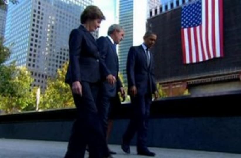 Obama and Bush walking to september 11 memorial (photo credit: REUTERS)