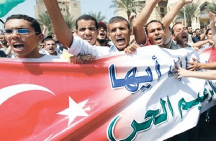 Egyptian in support of Erdogan 311 (photo credit: Mohamed Abd El-Ghany/Reuters)
