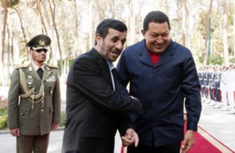 Iran's Ahmadinejad and Venezuela's Chavez 311 (R) (photo credit: Raheb Homavandi / Reuters)
