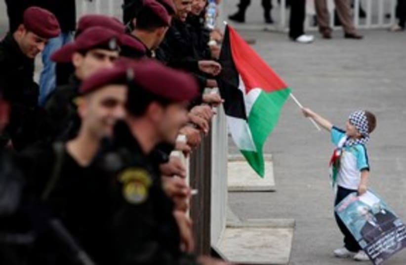 Palestinian boy at rally 311 (photo credit: REUTERS)