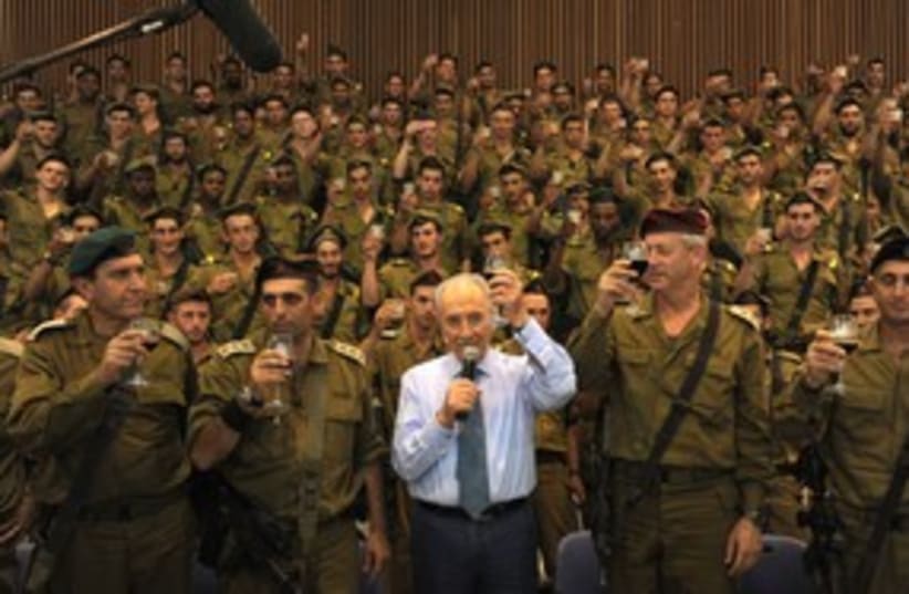President Shimon Peres with Golani soldiers 311 (photo credit: Moshe Milner /  GPO)