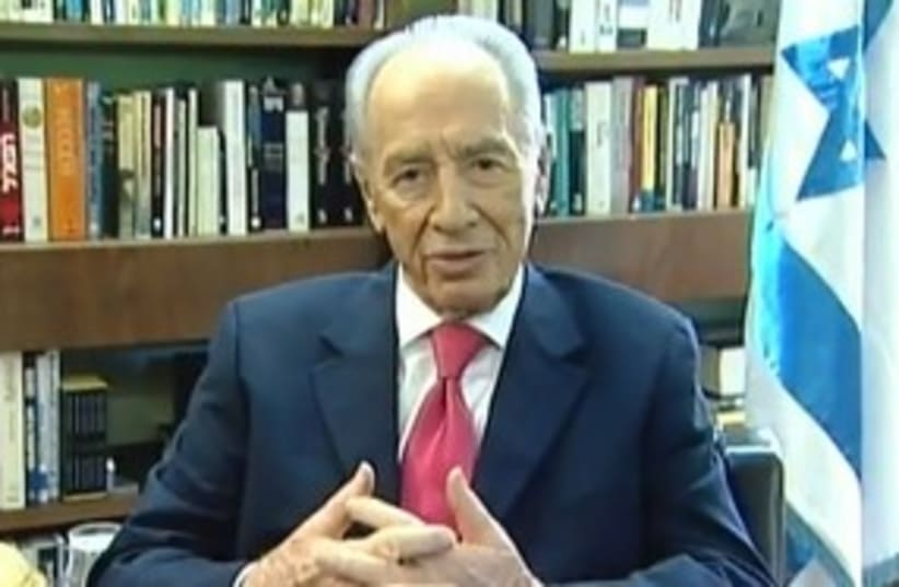 President Peres gives New Years greeting 311 (R) (photo credit: (YouTube))