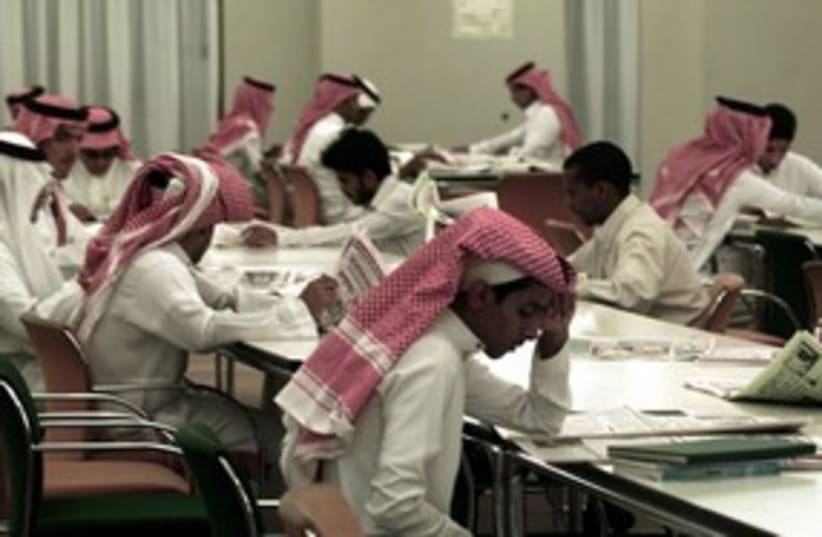 Saudi Arabian students reading 311 (R) (photo credit: REUTERS)