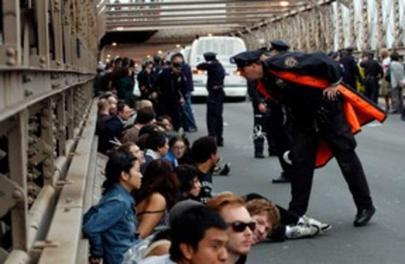 Occupy Wall Street activists on Brooklyn Bridge 311 (photo credit: REUTERS)