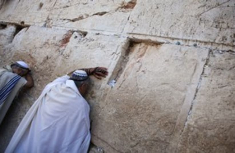 Jews praying at the Western Wall kotel 311 (R) (photo credit: Darren Whiteside / Reuters)