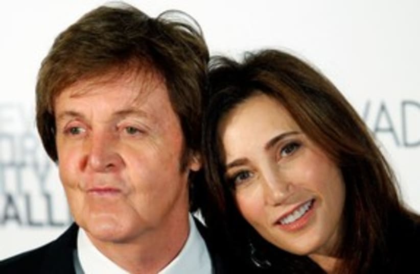 Paul McCartney and Nancy Shevell 311 (photo credit: REUTERS/Kena Betancur/Files)