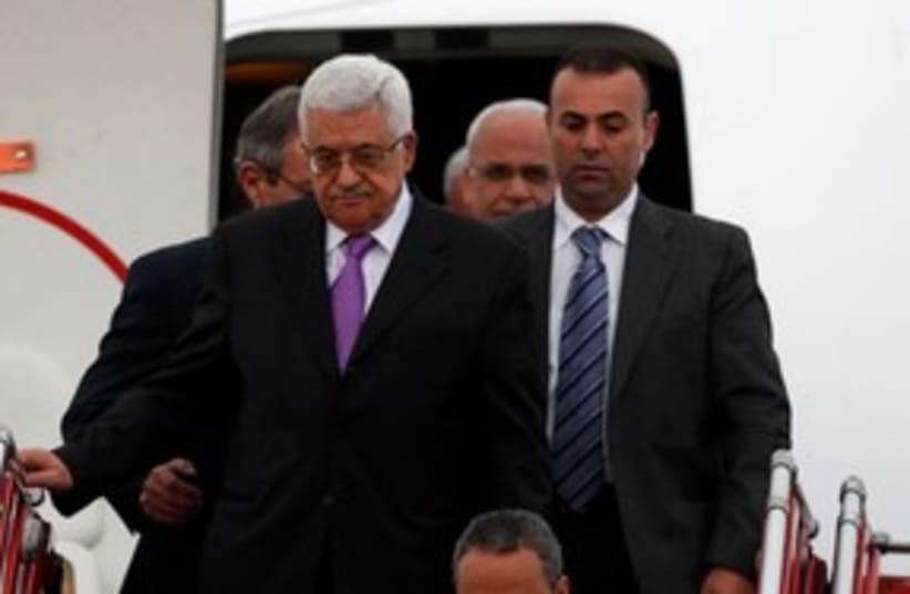 PA President Mahmoud Abbas arrives in Colombia 311 (R) (photo credit: REUTERS/John Vizcaino)