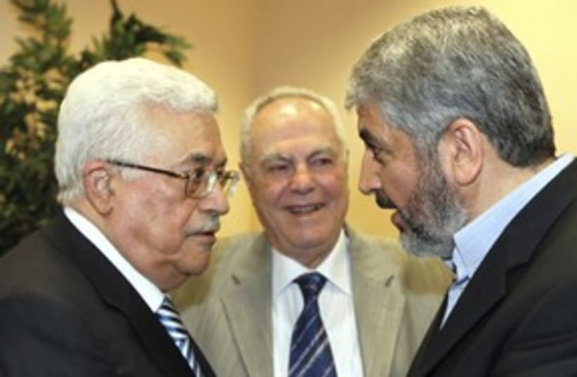 PA President Abbas with Hamas leader Khaled  Mashaal 311 (R) (photo credit: REUTERS/Ho New)