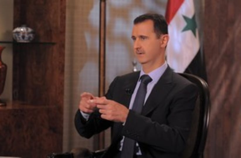 Syrian President Bashar Assad 311 (R) (photo credit: Sana / Reuters)
