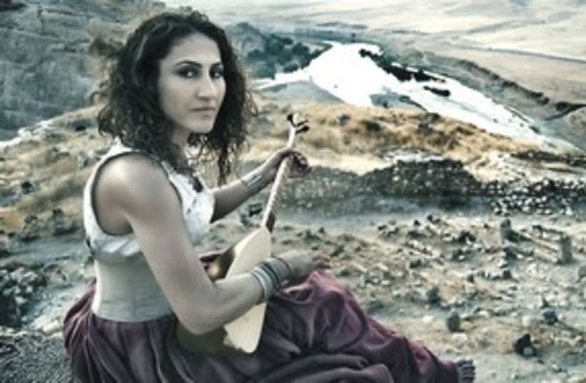 woman with oud 311 (photo credit: Courtesy of Sadat Mehader)