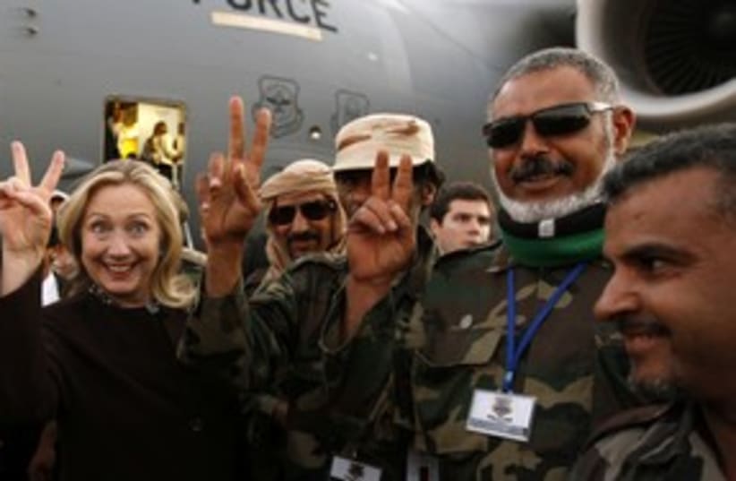Clinton in Libya peace sign_311 (photo credit: Reuters)