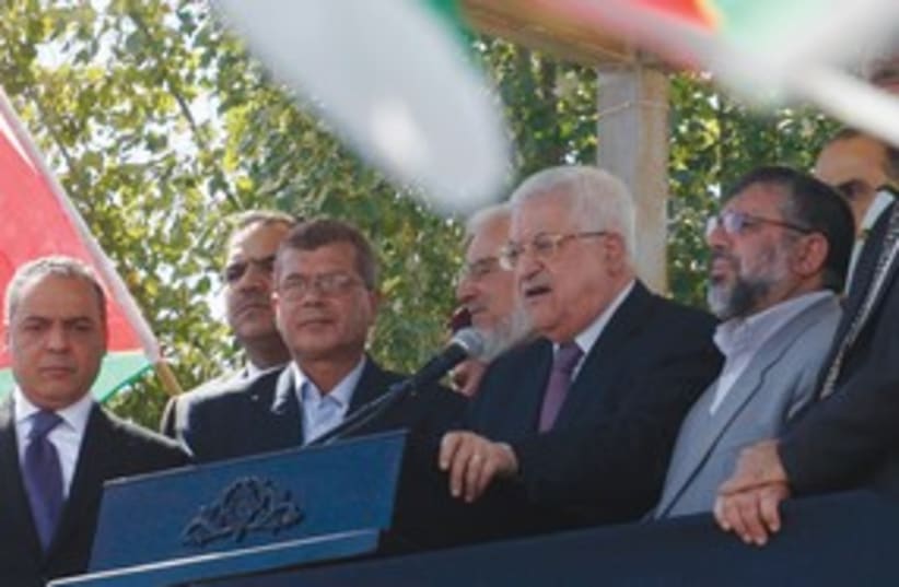 Abbas addresses released prisoners in Ramallah  (photo credit: REUTERS)