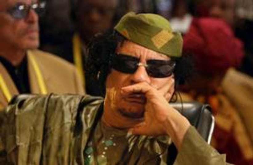 Former Libyan leader Muammar Gaddafi 311 (R) (photo credit: Reuters)