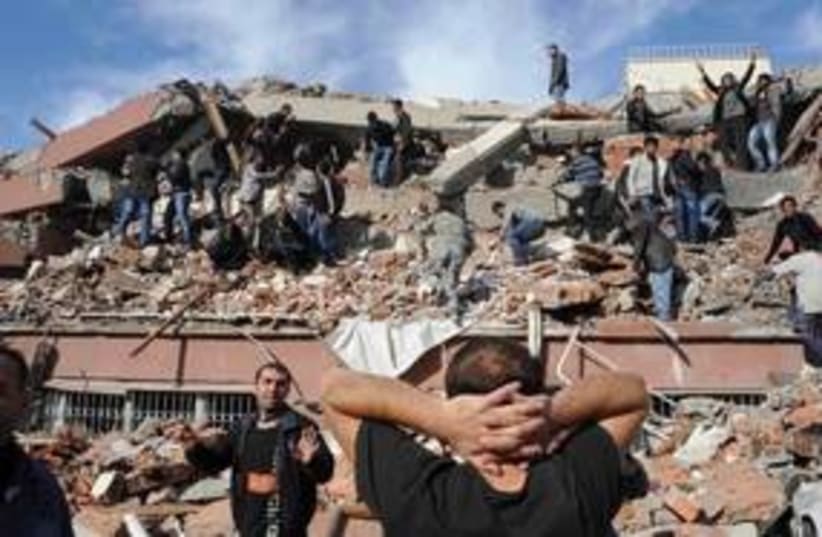 Rescue workers after earthquake in Turkey 311 (R) (photo credit: REUTERS/Abdurrahman Antakyali/Anadolu Agency)