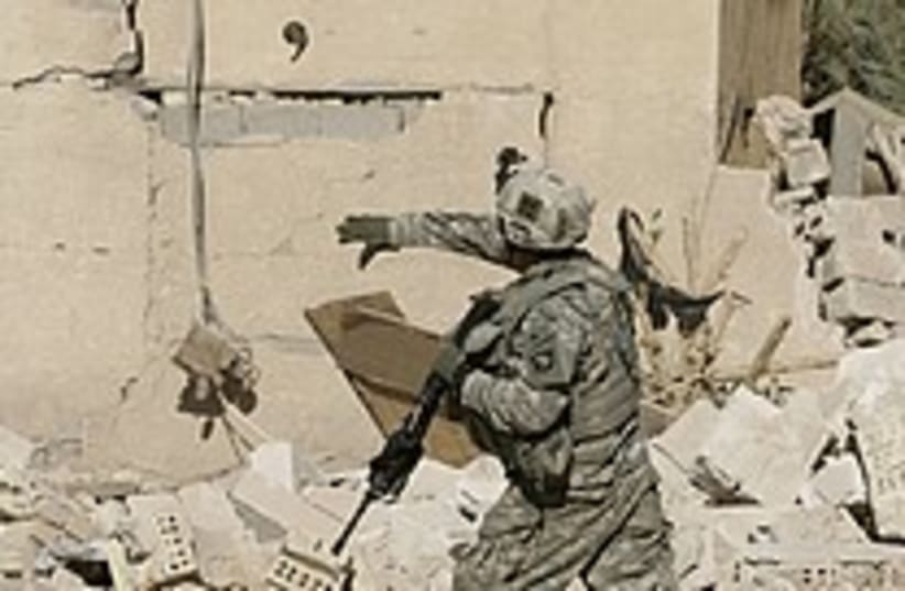 soldier iraq grenade  (photo credit: AP)