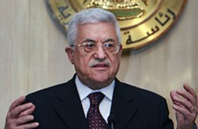 Abbas hands out 224.88 (photo credit: AP)