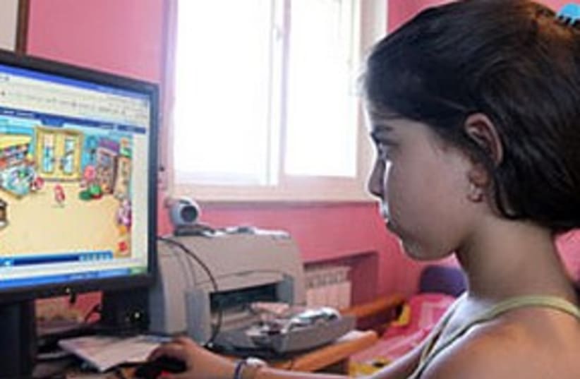 Girl on computer (photo credit: Ariel Jerozolimski)
