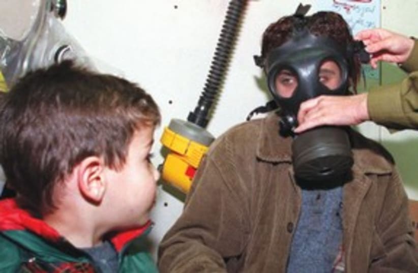 Gas mask kids 311 (photo credit: REUTERS)