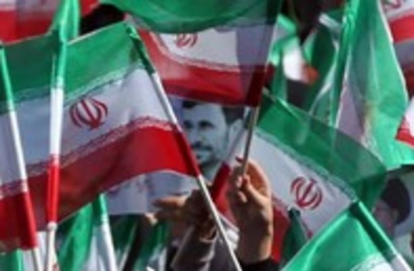 Iran flags ahmadinejad 300 (photo credit: REUTERS)