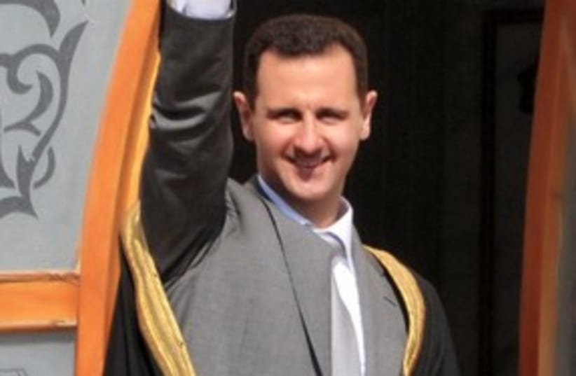 Syrian President Bashar Assad 311 (R) (photo credit: REUTERS/SANA/Handout)