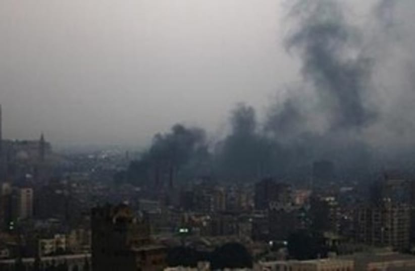 Smoke rises from burning garbage town in Cairo 311 R (photo credit: REUTERS/Amr Abdallah Dalsh)