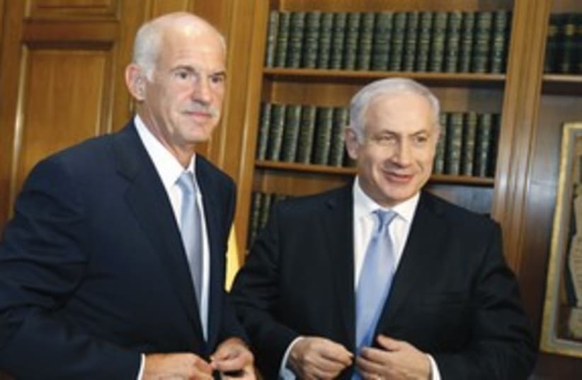 George Papandreou with PM Netanyahu 311 (R) (photo credit: Reuters)