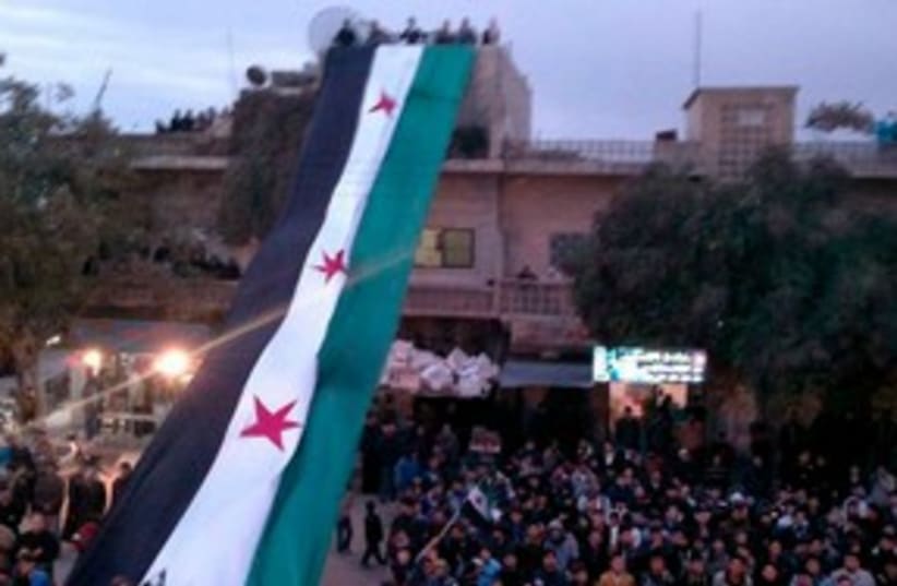 Syrian flag 311 (photo credit: REUTERS/Handout)