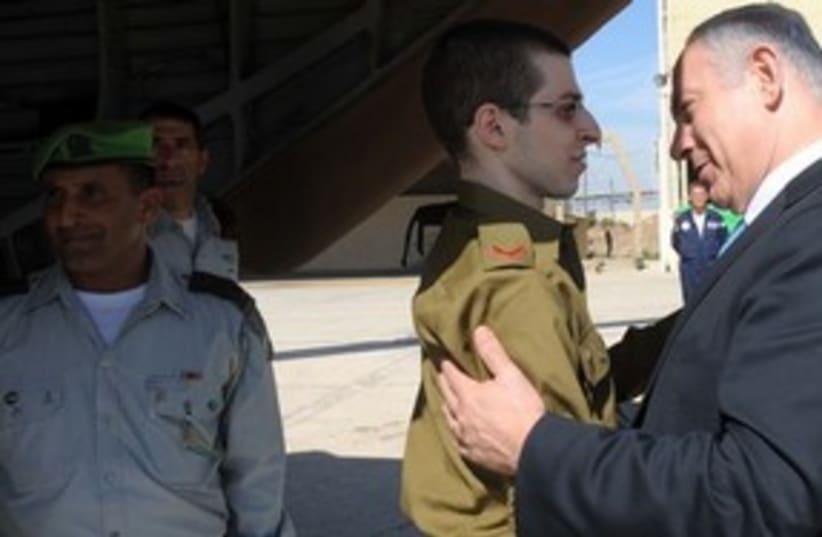 Gilad Schalit  and Netanyahu (photo credit: GPO)