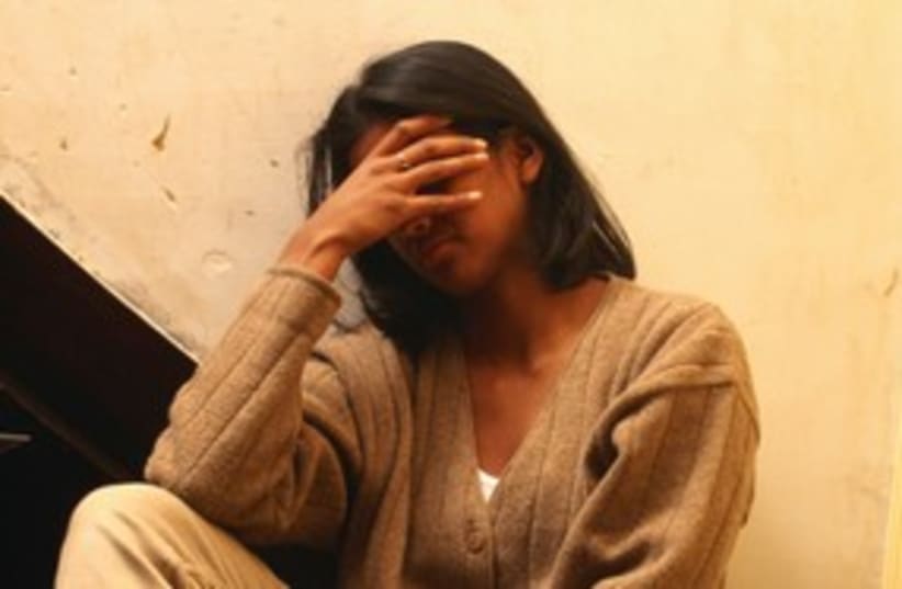 Domestic violence battered woman abuse 311 (photo credit: Thinkstock/Imagebank)