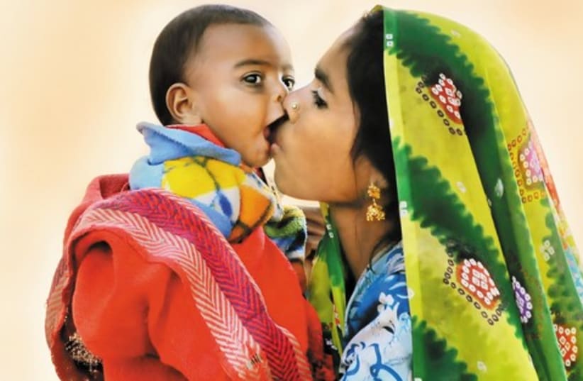 Parsha indian mother and baby 521 (photo credit: Israel Weiss)