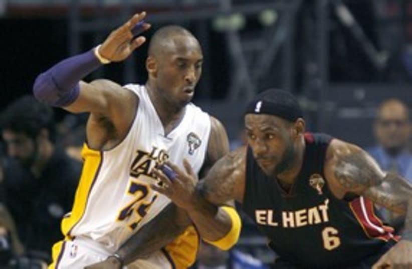 Kobe Bryant guards Lebron James NBA 311 (R) (photo credit: Andrew Innerarity / Reuters)