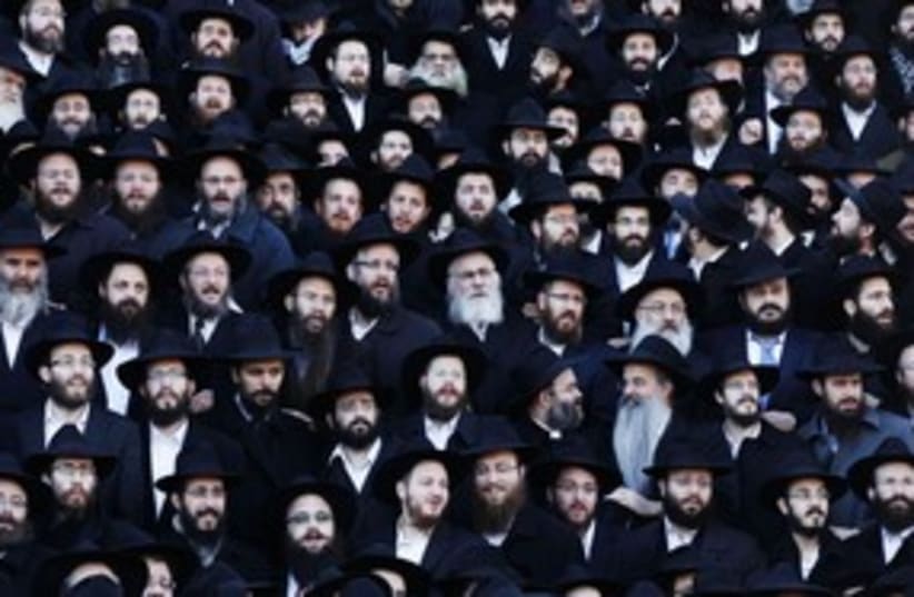 Chabad rabbis pose for group photo in Brooklyn 311 (photo credit: Reuters)