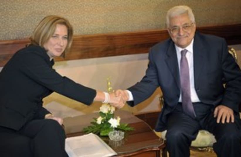 Tzipi Livni with Mahmoud Abbas OLD 311 (R) (photo credit: REUTERS/Amr Dalsh)