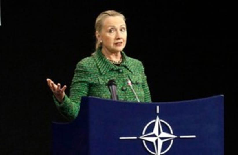 US Secretary of State Hillary Clinton at NATO HQ 311 (R) (photo credit: REUTERS/Sebastien Pirlet)
