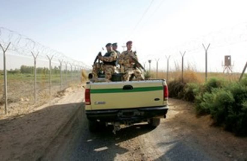 Iraqi patrol on Syrian border 311 R (photo credit: Reuters)