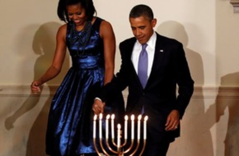 Obama and wife Michelle at White House Hannukah party 311 (photo credit: REUTERS)