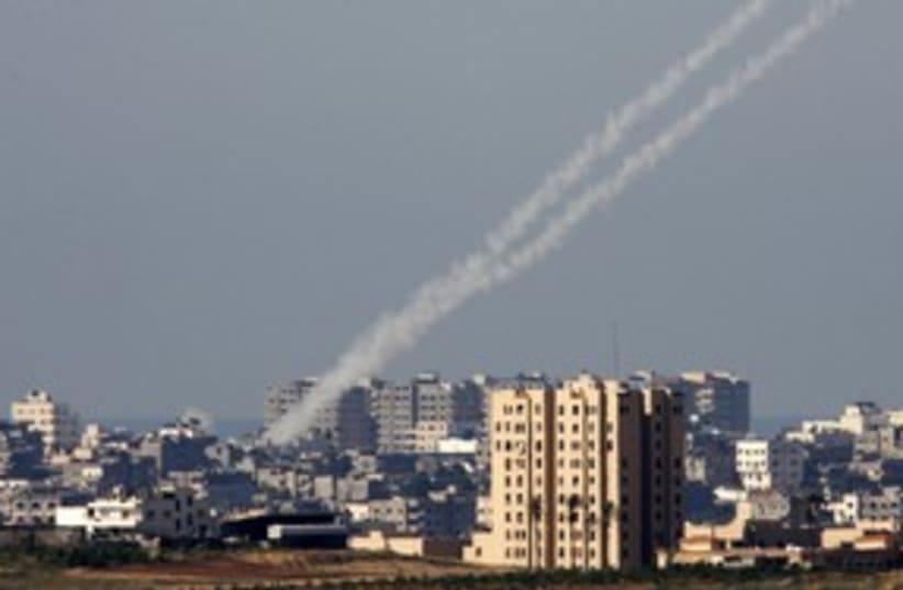 Kassam rockets being fired from the Gaza Strip 311 (R) (photo credit: Nikola Solic / Reuters)