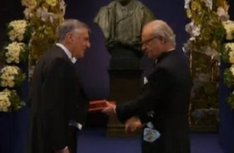 Dan Shechter is awarded the Nobel Prize 311 (photo credit: Channel 10)