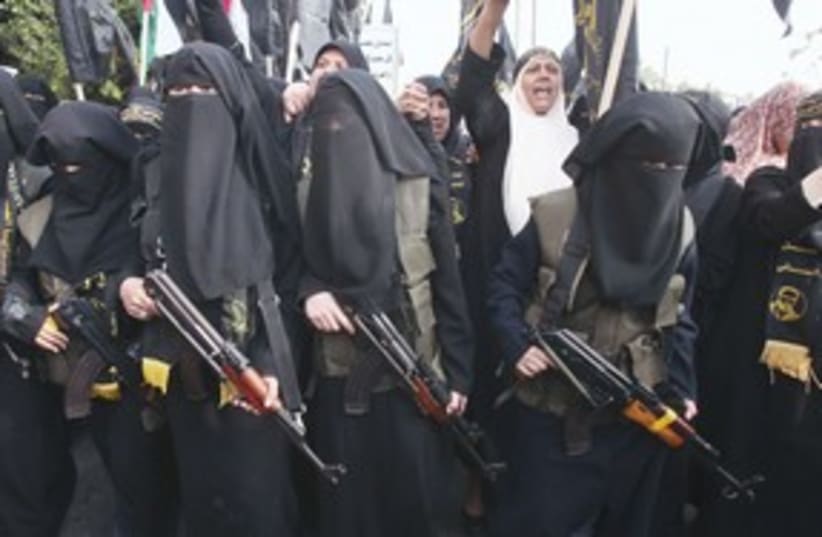 Muslim women with rifles, Gaza_311 (photo credit: Reuters)