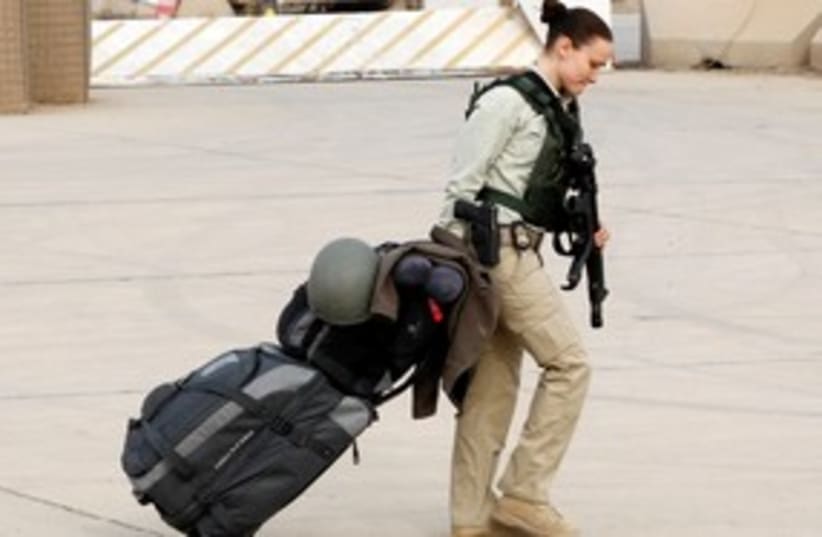 US soldier leaves Iraq 311 (photo credit: REUTERS)