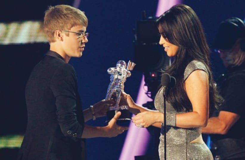 Kim Kardashian and Justin Bieber 521 (photo credit: REUTERS)