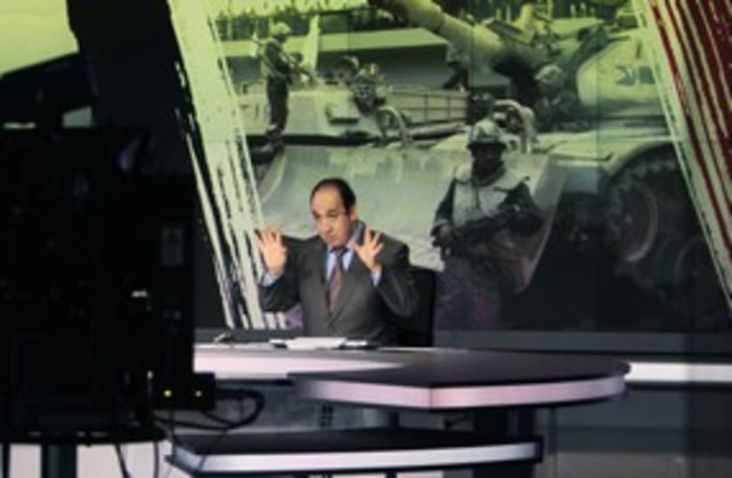 Announcer Abdul Samad Nasse_311 (photo credit: Reuters)