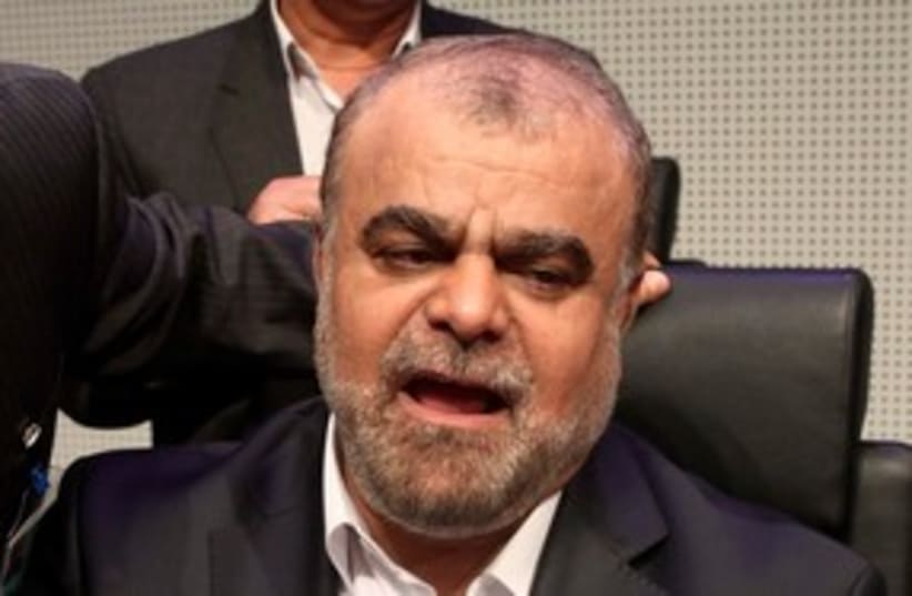 Iranian Oil Minister Rostam Qasemi 311 (R) (photo credit: REUTERS/Heinz-Peter Bader)