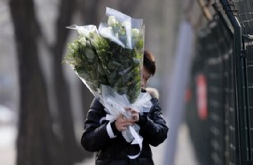 Kim Jong il mourner Beijing 311 R (photo credit: REUTERS/Jason Lee)